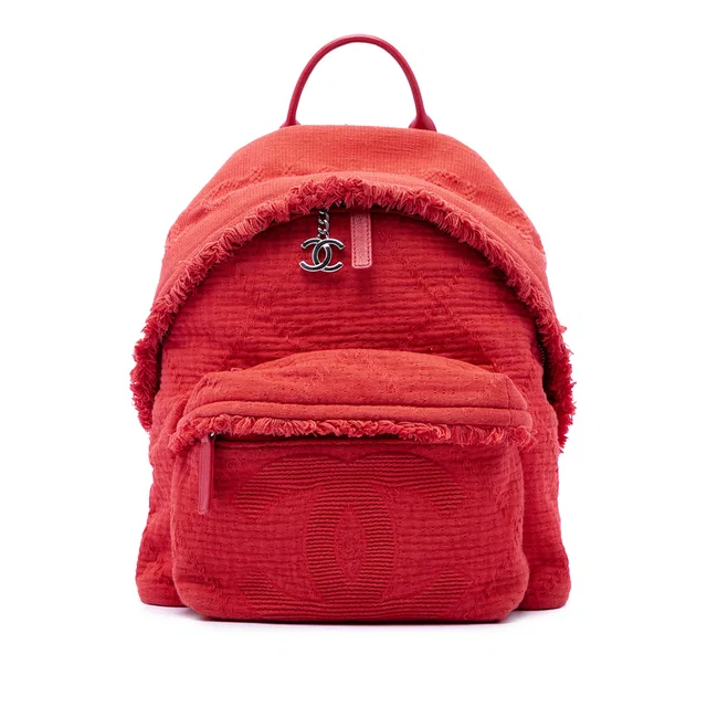 Red Chanel Quilted Canvas Front Pocket Fringe Backpack in Red Canvas from Designer Revival