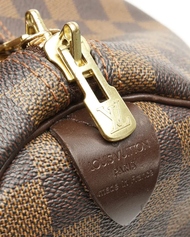 Louis Vuitton Damier Ebene Keepall 50 Weekend Bag in Brown Coated canvas from A Retro Tale, photo 7 of 14