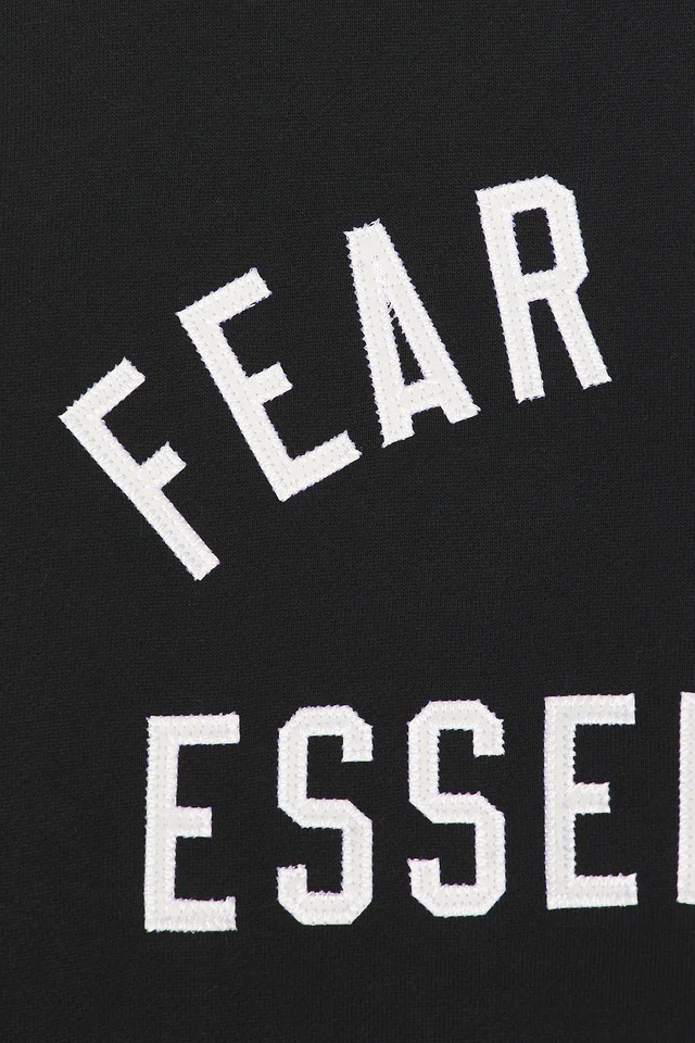 Fear of God ESSENTIALS 90'S Crewneck Sweatshirt in Vintage Black, photo 5 of 5 from REVOLVE (Canada)