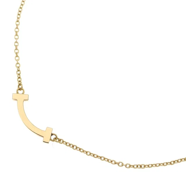 Tiffany & Co. T Smile Mini Necklace Pink Gold in Pink from The Reluxe