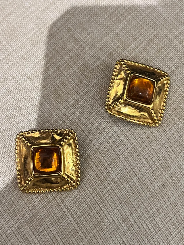 Saint Laurent golden earrings with amber style stone from Luxury Promise