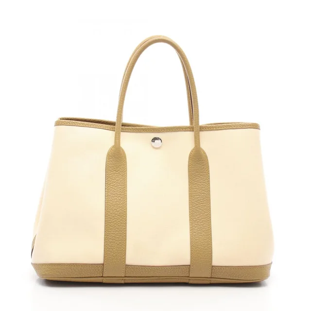 Hermès Tote Bag Garden Party TPM Vanille Cardamom Canvas Leather in Canvas from The Reluxe
