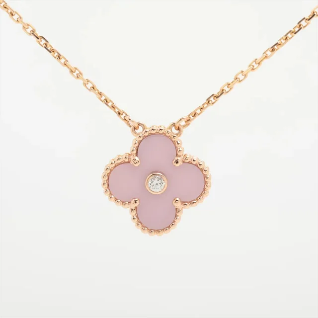 Van Cleef & Arpels Vintage Alhambra Holiday Pendant Pink Porcelain Diamond Necklace in Pink from The Purse Affair