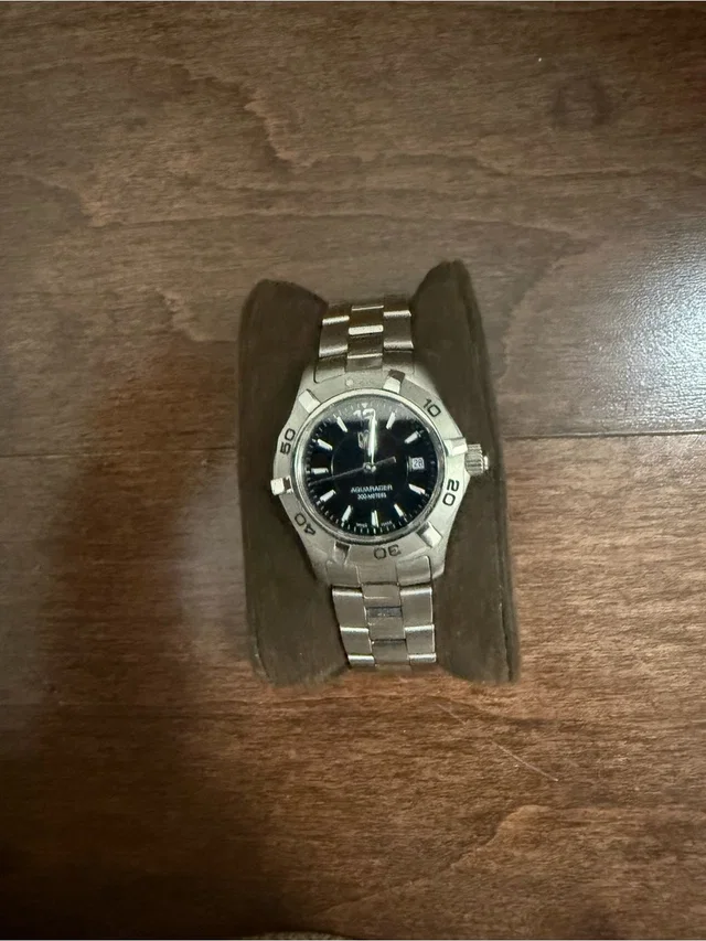 TAG Heuer Silver Stainless Steel Watch With Black Dial in silver|black|gray from Poshmark, photo 1 of 1