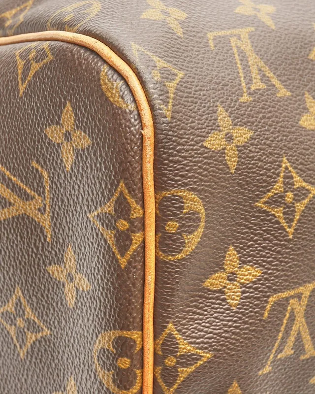 Louis Vuitton Monogram Keepall 55 Weekend Bag in Coated canvas from A Retro Tale, photo 9 of 13