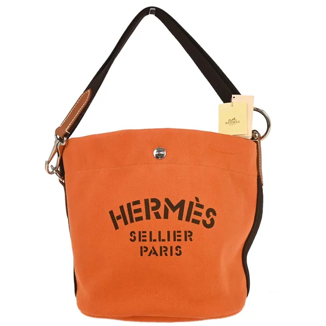 Hermès Orange Toile Chevron Sac de Pansage Bucket Shoulder Bag in Orange from AMORE Vintage Tokyo