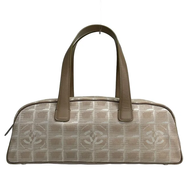 Chanel Handbag New Travel Line Beige White Leather in White Leather from The Reluxe