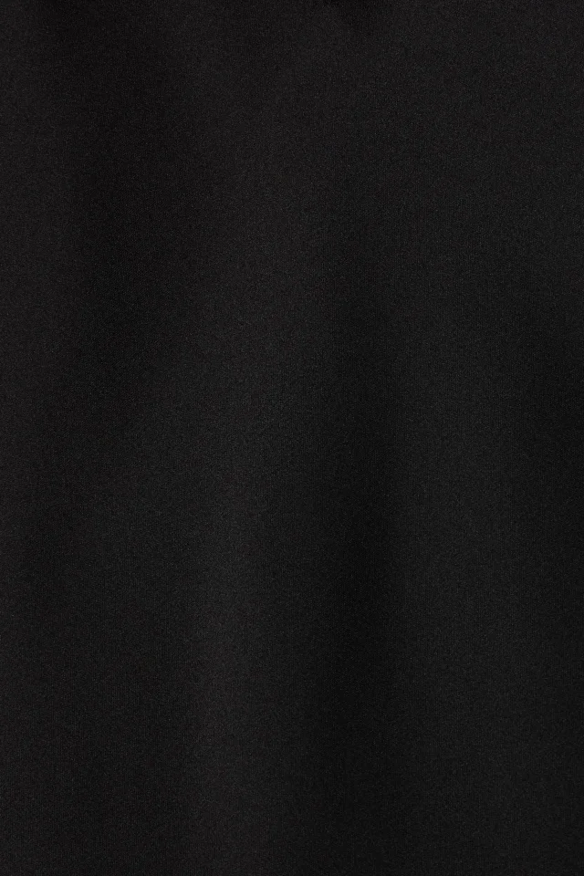 Norma Kamali Satin Mini Slip Dress in Black, photo 4 of 4 from THE OUTNET