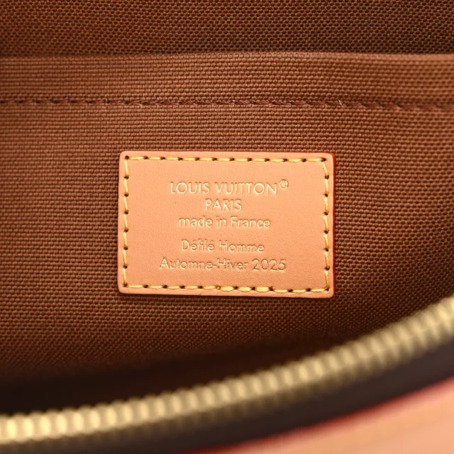 Louis Vuitton Reverse Monogram Drip Pochette Voyage Souple in Coated canvas from FASHIONPHILE, photo 6 of 8