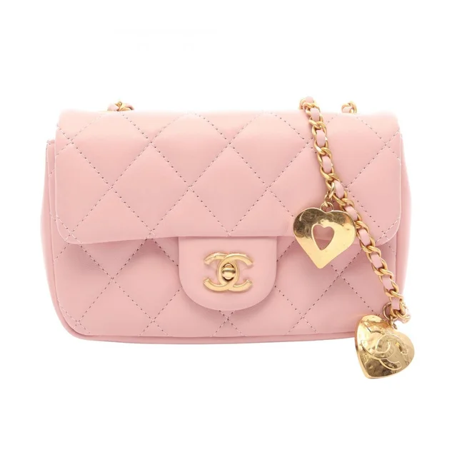 Chanel Shoulder Bag Mini Quilted Light Pink Lambskin Small Flap Chain in Pink Lambskin from The Reluxe