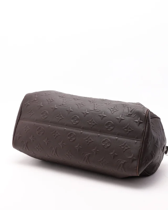 Louis Vuitton x Edun Revelation Keepall Bandoulière 45 Weekend Bag in Leather from A Retro Tale, photo 4 of 7