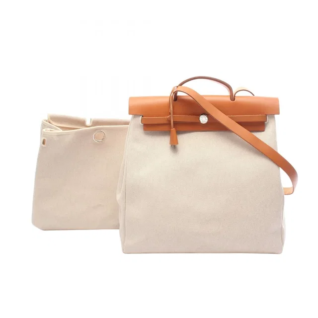Hermès Handbag Herbag MM Ecru Natural in Beige from The Reluxe
