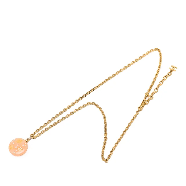 Gold Chanel CC Resin Faux Pearl Pendant Necklace in Gold Resin from Designer Revival