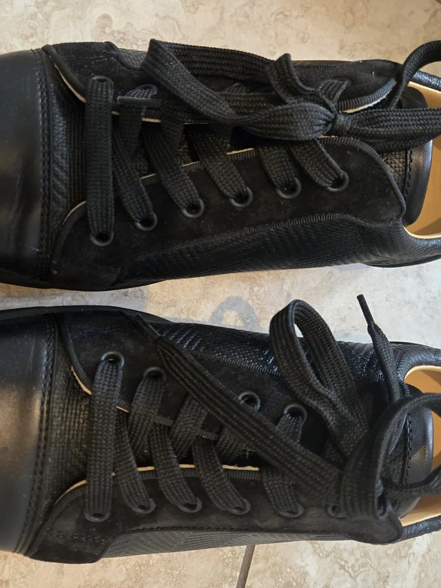 Christian Louboutin Men's Black Low-Top Lace-Up Sneakers With Textured Upper in black from Poshmark