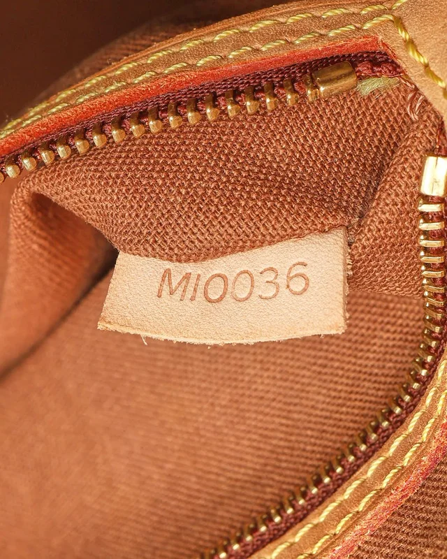 Louis Vuitton Monogram Batignolles Vertical Tote Bag in Coated canvas from A Retro Tale, photo 9 of 10