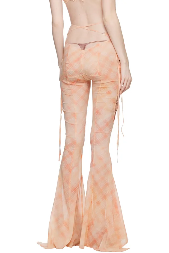 KNWLS Orange Glimmer Trousers, photo 3 of 4 from SSENSE
