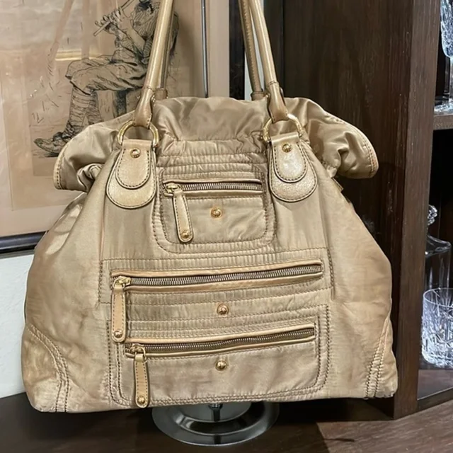 Tod's Pashmy Media D Bag in gold Nylon from Poshmark