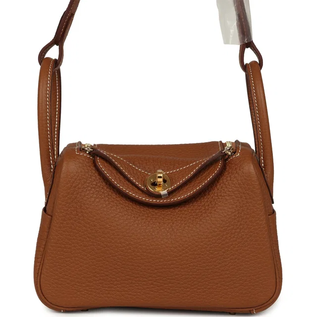Hermès Mini Lindy Gold Clemence Gold Hardware in Gold Clemence leather from Madison Avenue Couture