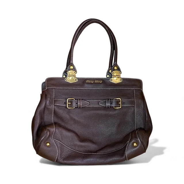 Miu Miu Women's Shoulder bags - Brown in brown|red from Depop, photo 1 of 1