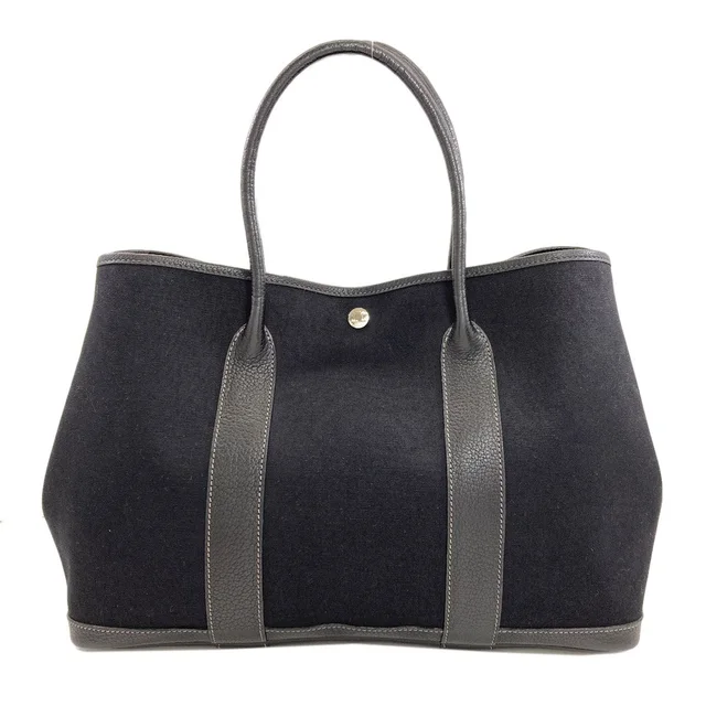 Hermès Garden Party PM Silver Tote Bag Toile Officier Negonda in Silver from The Reluxe