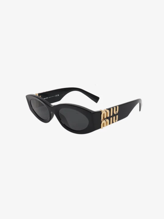 Miu Miu Black abd gold oval sunglasses in Black from Sign of the Times, photo 2 of 7