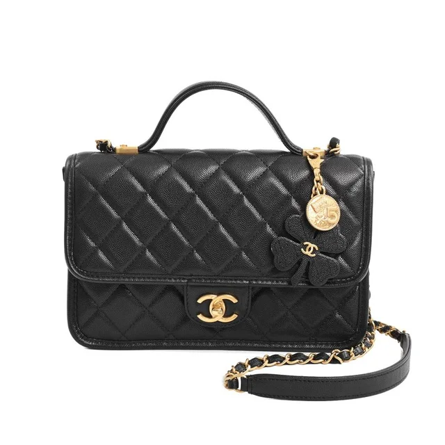 Chanel Shoulder Bag Top Handle Flap in Caviar leather from The Reluxe