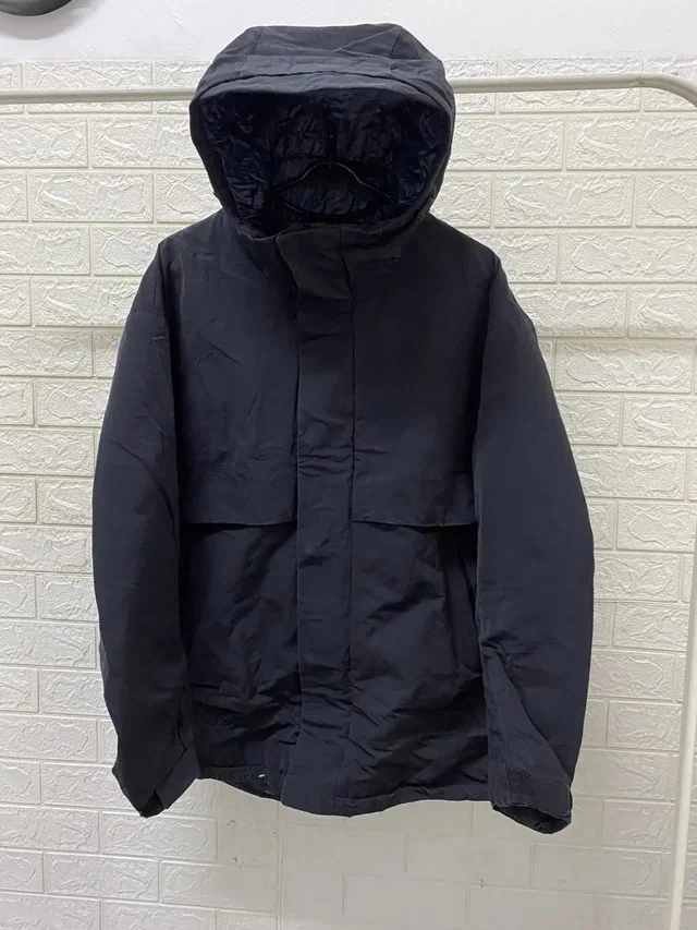Jil Sander X Uniqlo Light Jacket in blue from Grailed