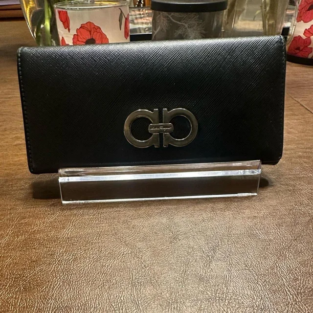 Ferragamo Women's Wallet - Black in black Caviar leather from Depop, photo 1 of 1