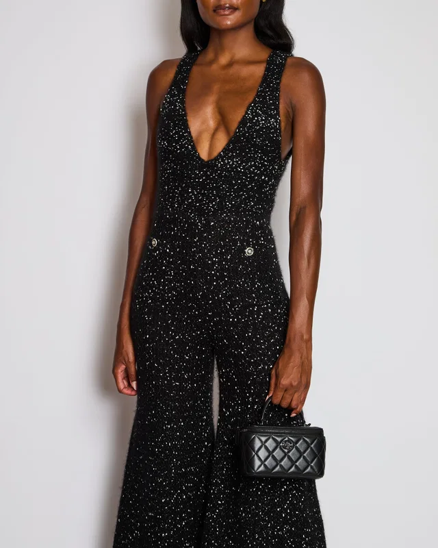 Chanel 23/K Black Knitted Jumpsuit with Pocket and CC Flower Button Detail Size FR 34 (UK 6) in Black Silk from Sellier