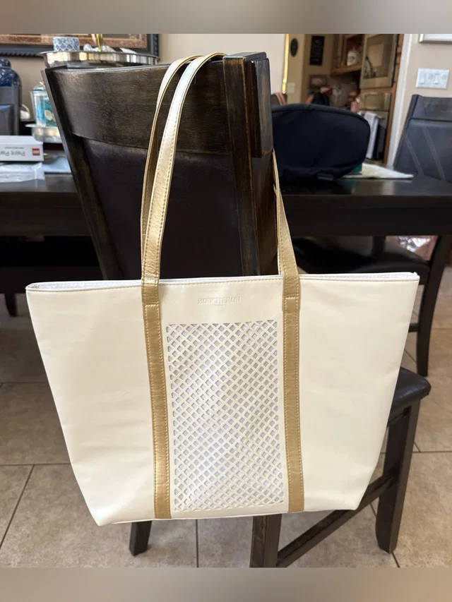 Boucheron Paris Cream & Gold Faux Leather Tote Bag in gold Leather from Poshmark