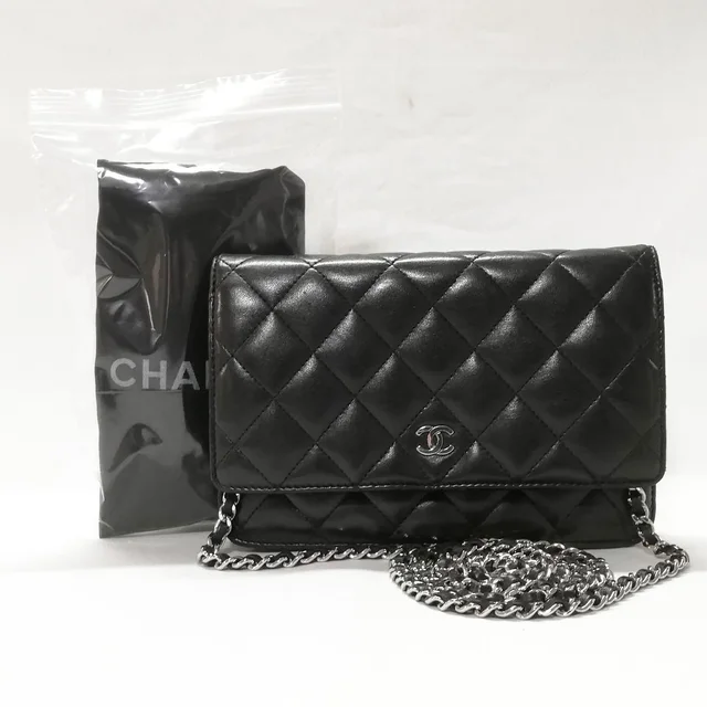 Chanel Lambskin Chain Wallet CC Logo Black Shoulder Bag in Black Lambskin from The Reluxe