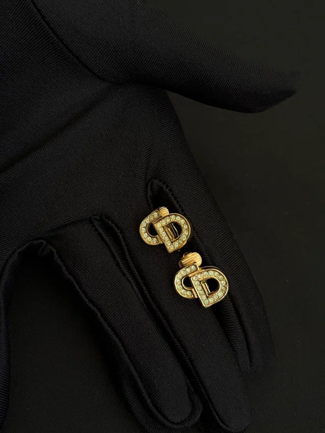 Dior Gold Crystal CD Logo Ear Clips in Gold from Luxury Promise