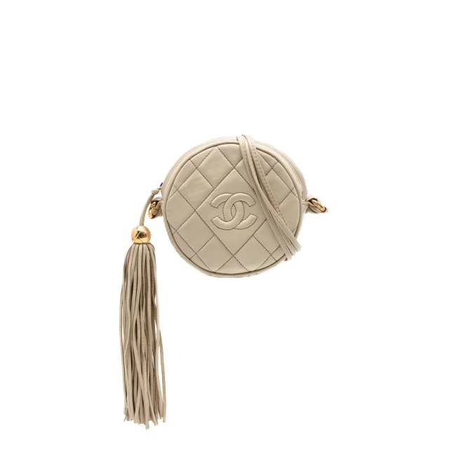 Chanel CC Quilted Lambskin Tassel Round Crossbody in brown|red Lambskin from The RealReal
