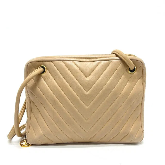 Chanel Handbag Stitch Chevron Lambskin Beige in Beige Lambskin from The Reluxe