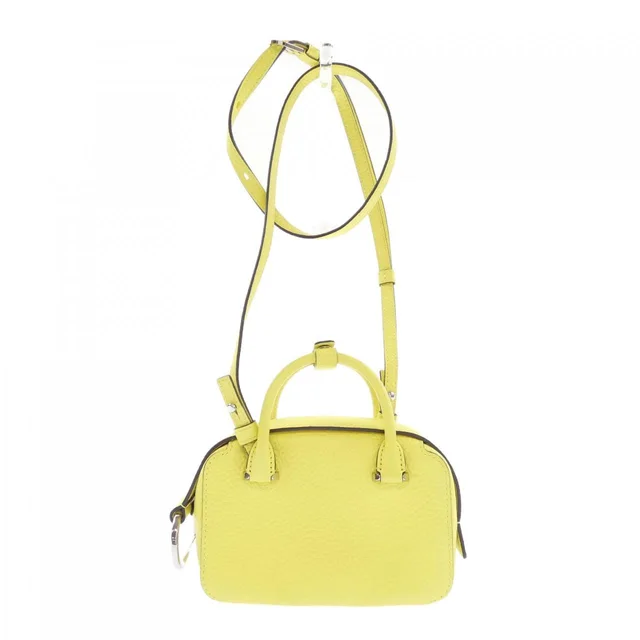 Delvaux Cool Box Bag in Yellow type NANO from KOMEHYO