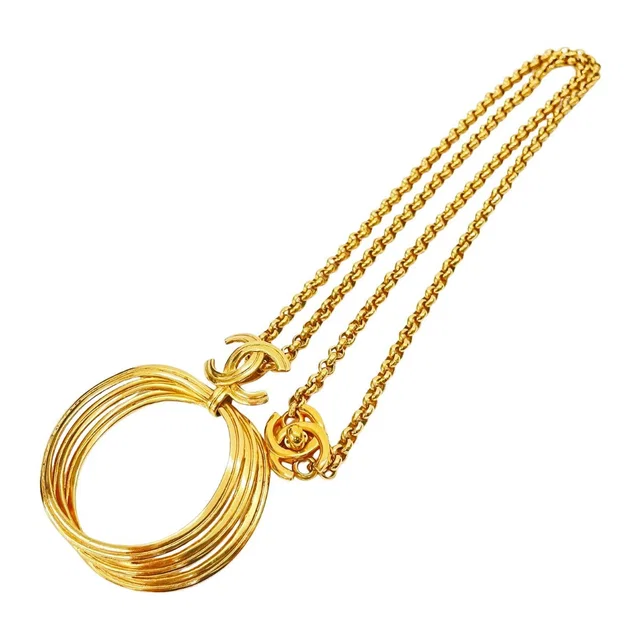 Chanel Pendant Spring Collection CC Logo Turnlock Gold Vintage in Gold from The Reluxe