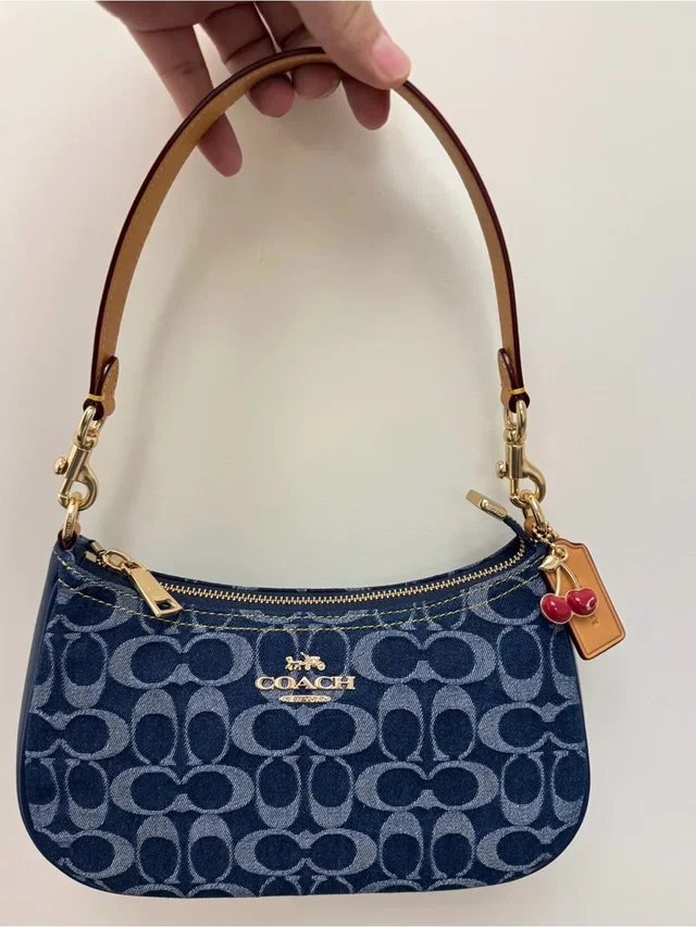Coach Navy Signature Mini Shoulder Bag With Tan Strap And Red Charm in neutral|blue|brown Leather from Poshmark