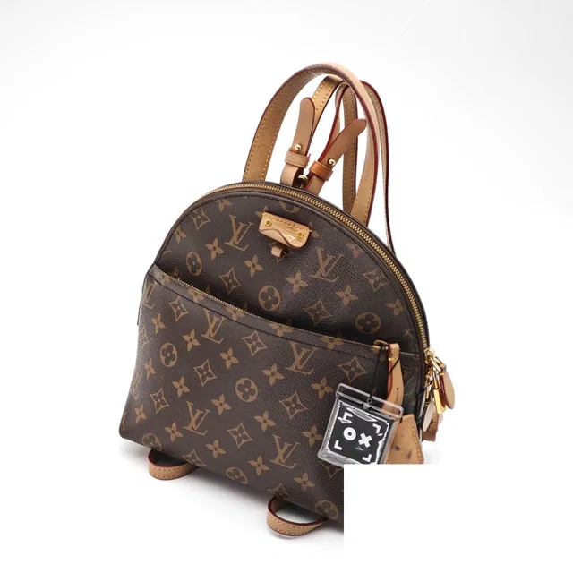 Louis Vuitton Moon Backpack 2-Way Handbag Brown Padlock Key in Brown Coated canvas from The Reluxe