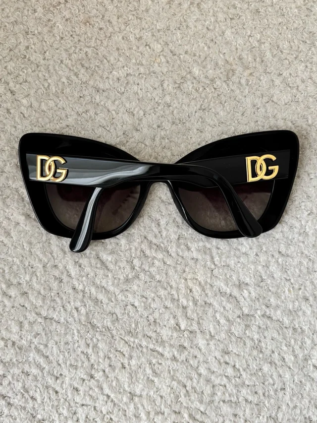 Dolce & Gabbana Glossy Black Cat-Eye Sunglasses With Gold Dg Logo in black|gold from Poshmark