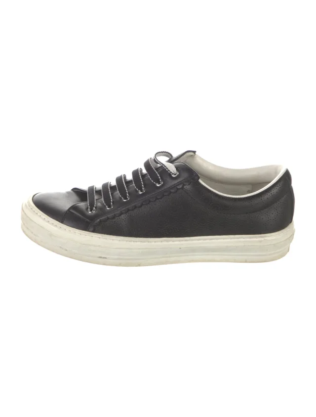 Ferragamo Leather Sneakers in black Leather from The RealReal