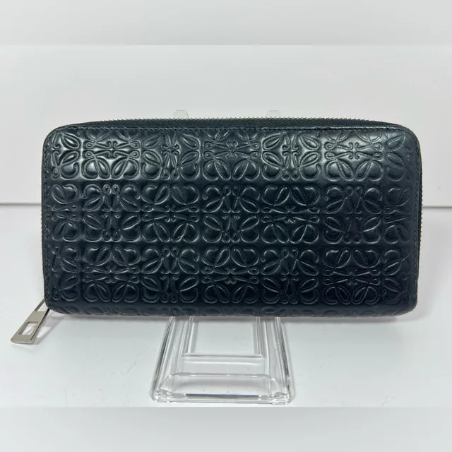 1165: Loewe Anagram Embossed Zip Wallet Leather Spain in black Leather from Poshmark