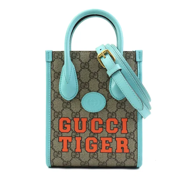 Blue Gucci Mini GG Supreme Web Tiger Retro Interlocking G Satchel in Blue Coated canvas from Designer Revival