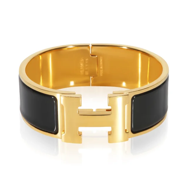 Hermès Gold-Plated Clic Clac Noir Bracelet in Black from HEWI, photo 1 of 1