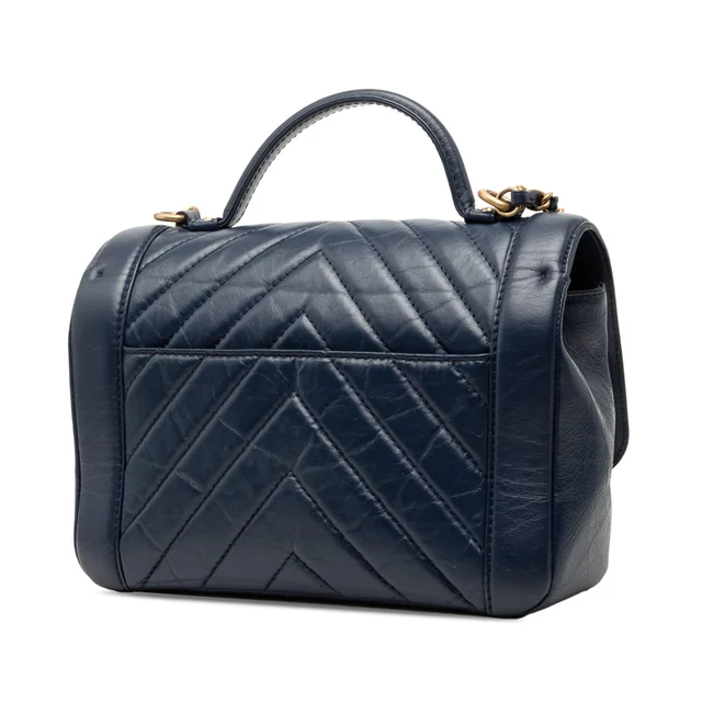 Blue Chanel CC Chevron Aged Calfskin Top Handle Flap Satchel in Blue Calfskin from Designer Revival, photo 2 of 2