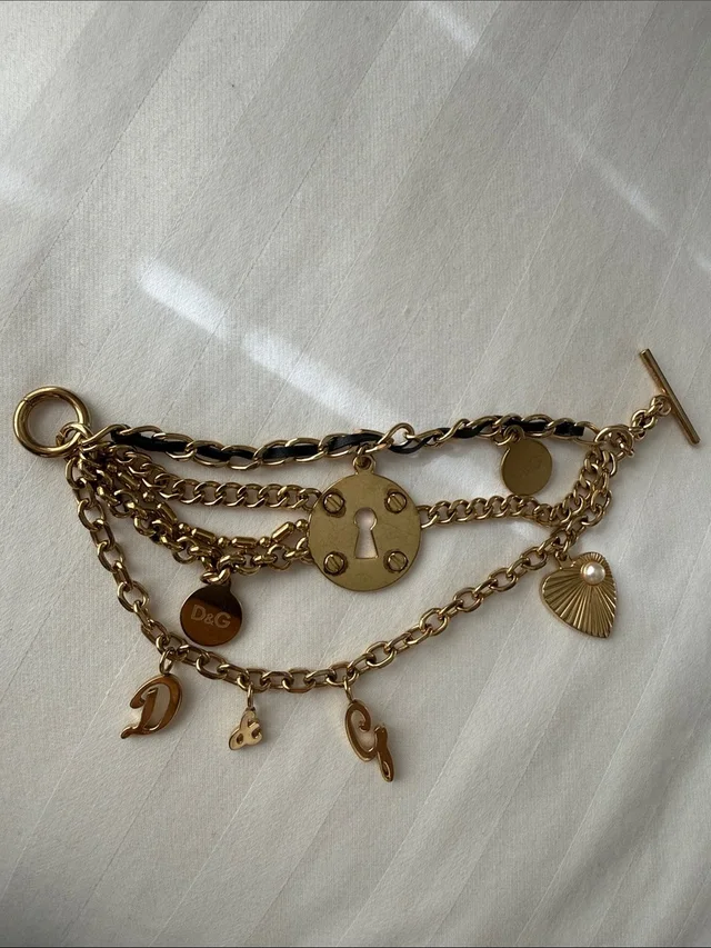 Dolce & Gabbana Tone Charm Bracelet With Heart And Keyhole Charms in gold Leather from Poshmark