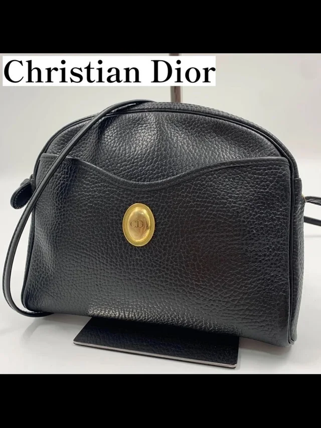 Dior Black Pebbled Leather Bag With Gold Cd Emblem in black|gold Leather from Poshmark, photo 1 of 1