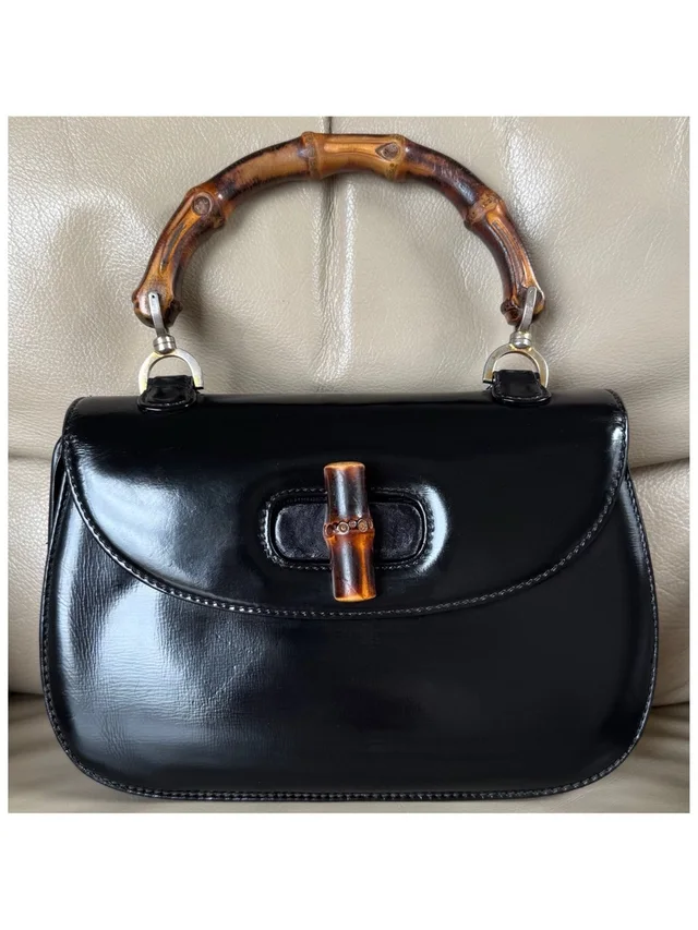 Gucci Vintage 1947 Black Leather Bamboo Top Handle Turn Lock Bag in black Leather from Poshmark