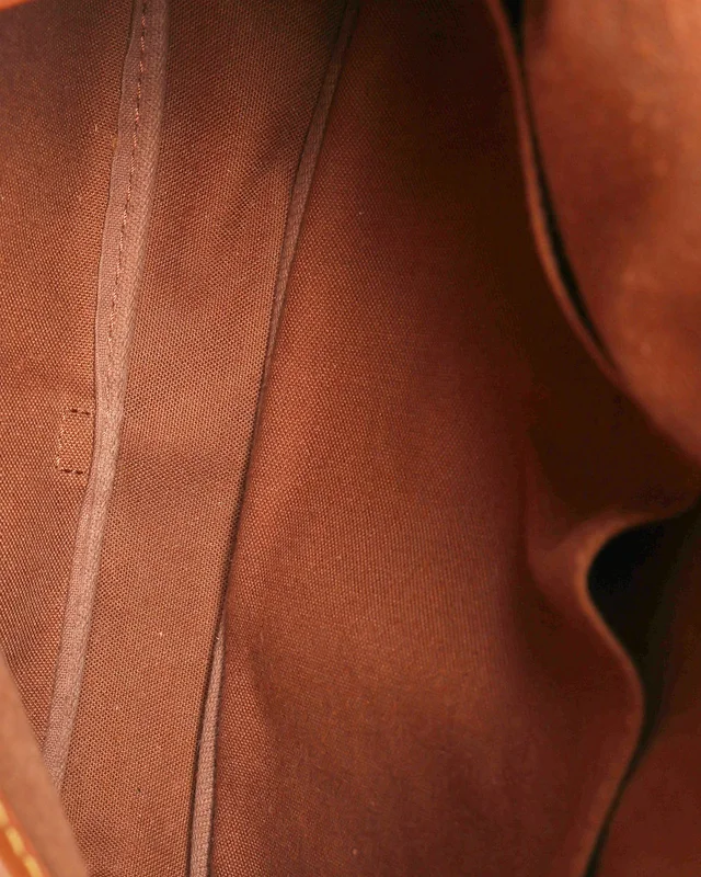 Louis Vuitton Monogram Saumur 30 Bag in Coated canvas from A Retro Tale, photo 9 of 10