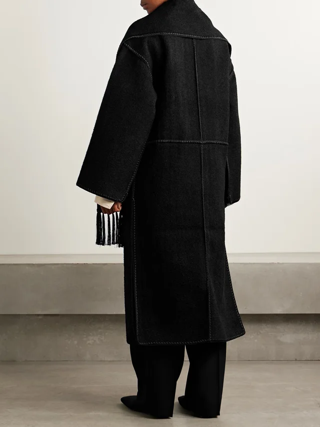 TOTEME Draped fringed wool-blend bouclé coat in black 68% Wool 20% Recycled wool 12% Recycled polyester, photo 4 of 5 from NET-A-PORTER (Canada)