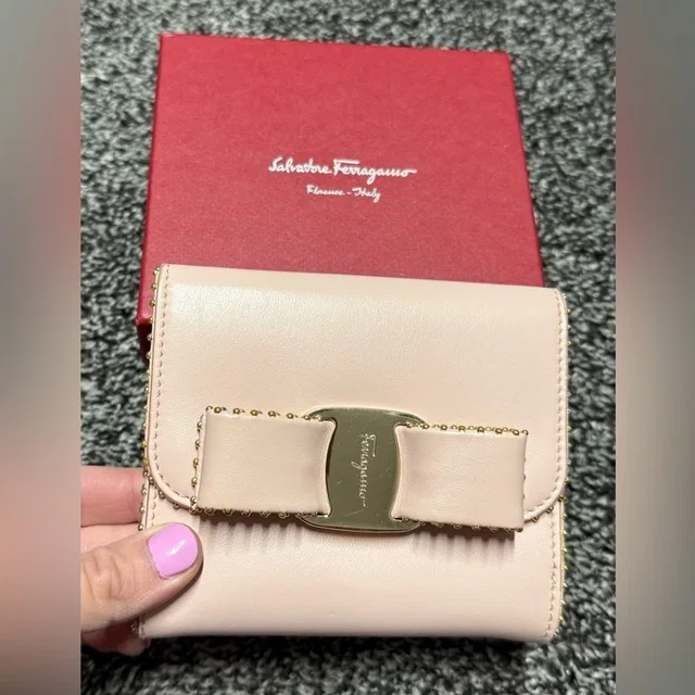 Ferragamo Vara Bow Pink Compact Wallet in pink from Poshmark